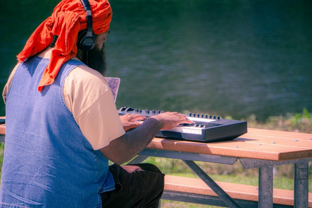 Man playing keyboard — courtesy of Osmany M Leyva Aldana.